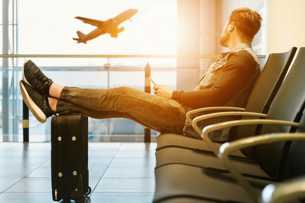 Man sat at the airport