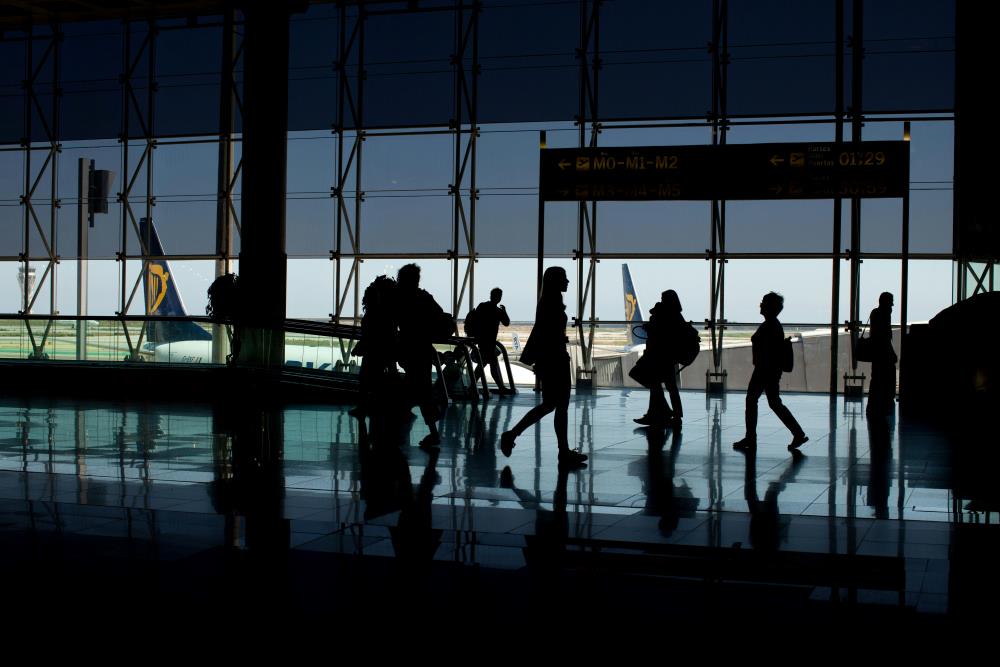 Silhouette of People at the Airport