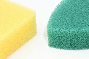 a yellow sponge and a blue sponge
