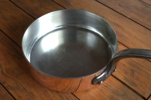 a silver pan of warm water